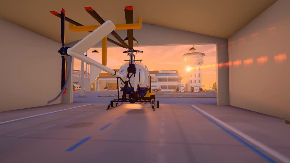 Looking out of a hangar bay at dawn, a helicopter with its blades folded